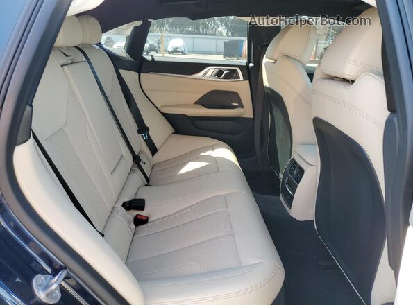 WBY23HD04SFU02272 2025 BMW I4 Blue Vista de los asientos traseros