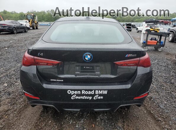 WBY33HD06SFU10216 2025 BMW I4 Black Widok z tyłu
