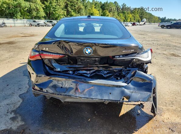 WBY43AW09RFT15359 2024 BMW I4 Charcoal Vista trasera