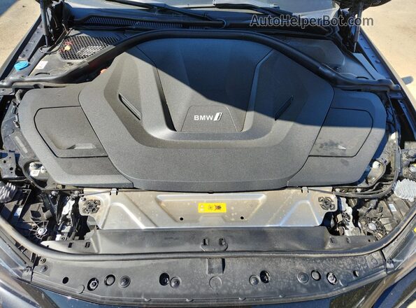 WBY43AW09RFT15359 2024 BMW I4 Charcoal Vista interior trasera