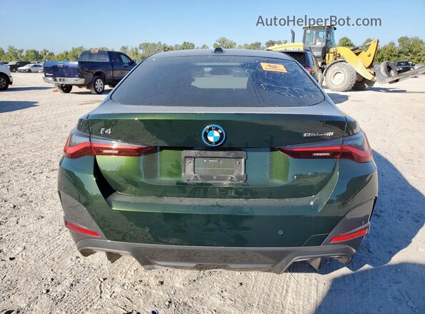 WBY73AW02RFR57337 2024 BMW I4 Green Widok z tyłu