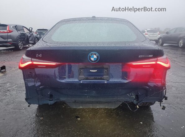 WBY73AW05NFN20880 2022 BMW I4 Blue Rear view