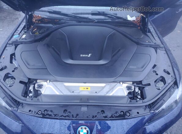 WBY73AW05NFN20880 2022 BMW I4 Blue Rear interior view