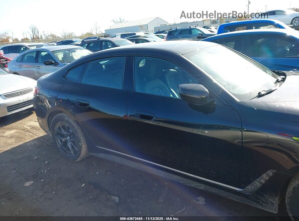 WBY73AW08PFN89386 2023 BMW I4 Black Widok wnętrza z tyłu
