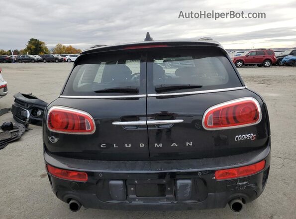 WMWLU5C50H2E83575 2017 MINI COOPER Black Rear view