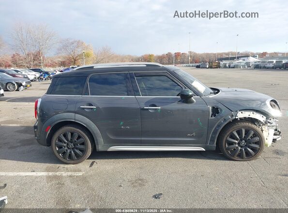 WMZYT5C32H3D80047 2017 MINI COUNTRYMAN Gray Vista interior trasera