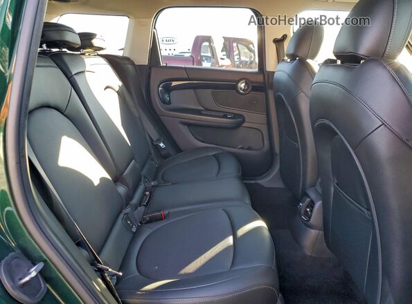 WMZYV5C30J3E04698 2018 MINI COOPER Green Vista de los asientos traseros