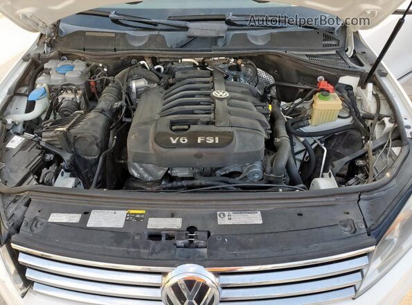 WVGEF9BP5GD007401 2016 VOLKSWAGEN TOUAREG White Vista interior trasera