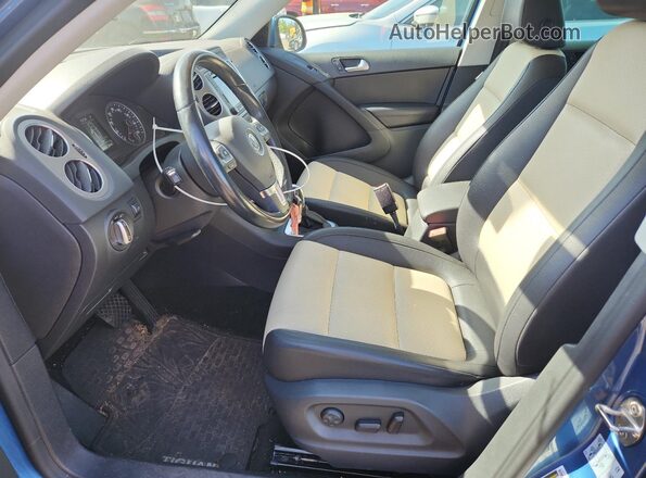 WVGSV7AX9HW511189 2017 VOLKSWAGEN TIGUAN Blue Vista interior delantera