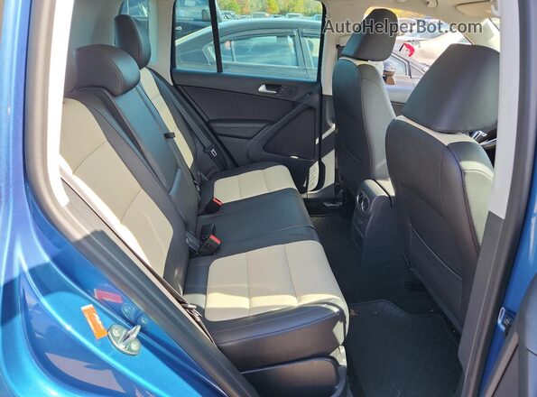 WVGSV7AX9HW511189 2017 VOLKSWAGEN TIGUAN Blue Vista de los asientos traseros