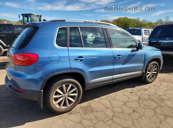 WVGSV7AX9HW511189 2017 VOLKSWAGEN TIGUAN Blue Trasero derecho