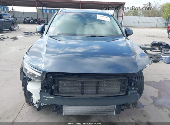 YV4162UL4N2697409 2022 VOLVO XC40 Dark Blue Вид задньої частини салону