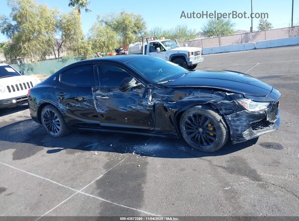 ZAM57XSA9J1286664 2018 MASERATI GHIBLI Black Вид задньої частини салону