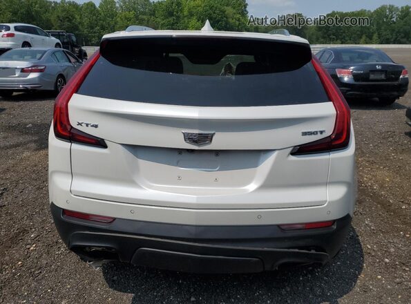 1GYAZAR48NF105566 2022 CADILLAC XT4 White Widok wnętrza z przodu
