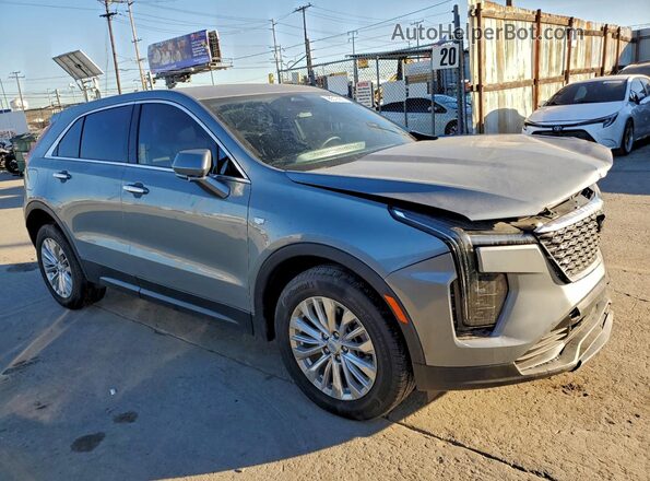 1GYAZAR45RF244379 2024 CADILLAC XT4 Серебряный 