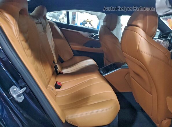 WBAGV8C01SCS40022 2025 BMW M8 Black უკანა სალონის ხედი