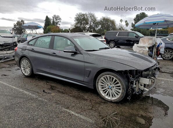WBA4A9C54GGL89475 2016 BMW 4 SERIES Black Front view