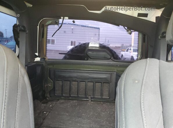 1C4GJXAN2MW574262 2021 JEEP WRANGLER Green Vista de los asientos traseros
