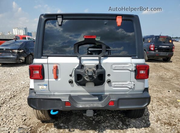 1C4JJXP6XPW662308 2023 JEEP WRANGLER Silver Widok z tyłu