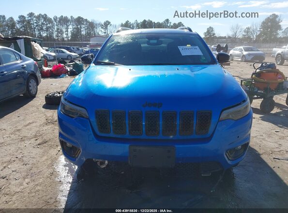 1C4PJMMB2PD106869 2023 JEEP CHEROKEE Blue Вид задньої частини салону