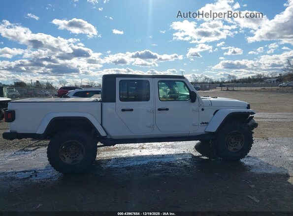 1C6HJTAG0ML597062 2021 JEEP GLADIATOR White Vista interior trasera