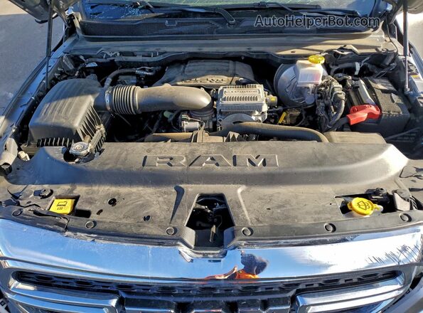 1C6SRFGT8RN171202 2024 RAM 1500 Серебряный Вид задней части салона