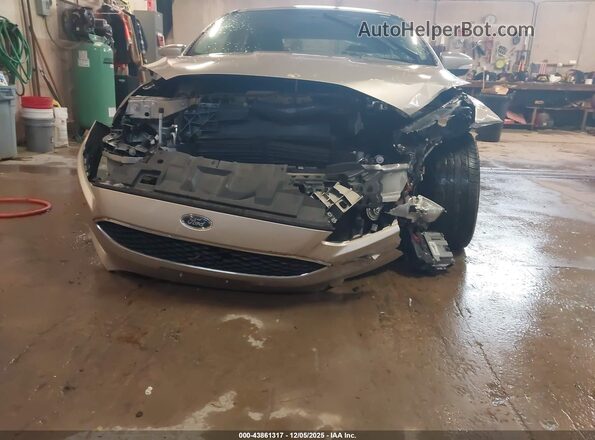 1FADP3F20HL317817 2017 FORD FOCUS Champagne Вид спереди