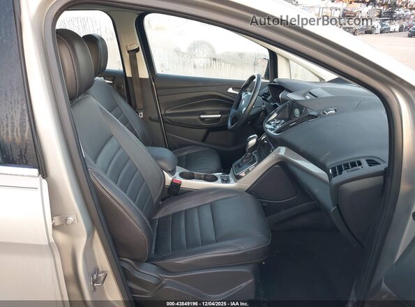 1FADP5CUXGL118676 2016 FORD C-MAX ENERGI Brown Widok wnętrza z przodu