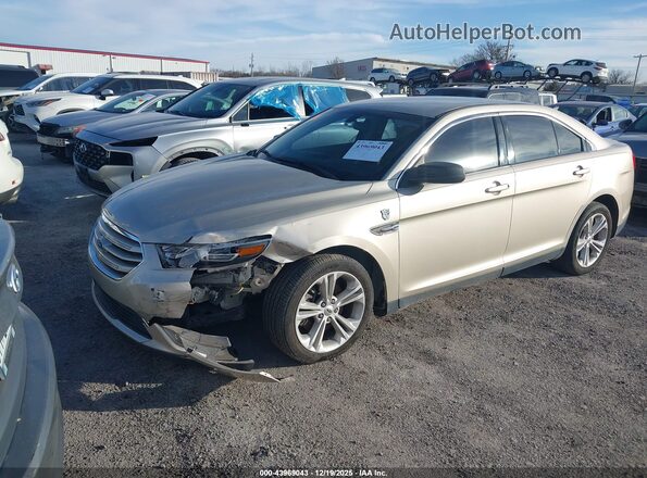 1FAHP2D85JG101088 2018 FORD TAURUS Gold Vista tres cuartos delantera izquierda