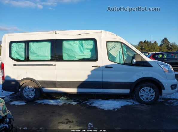 1FBAX2C83NKA73702 2022 FORD PASSENGER White Rear interior view