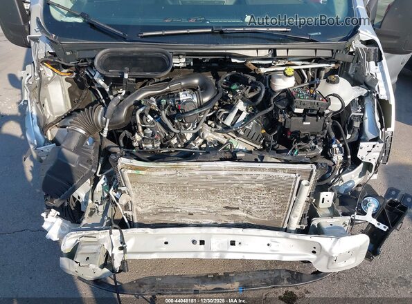 1FBAX2C83RKB79041 2024 FORD PASSENGER Silver Вид ззаду