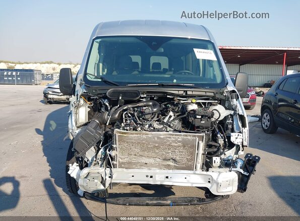 1FBAX2C83RKB79041 2024 FORD PASSENGER Silver Вид задньої частини салону