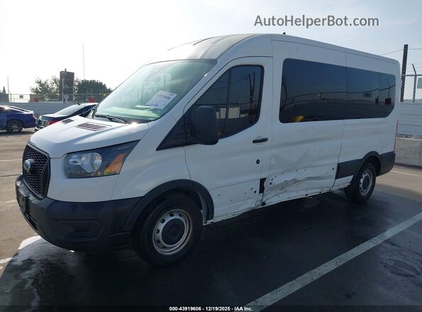 1FBAX2C84RKB30074 2024 FORD PASSENGER White Vista tres cuartos delantera izquierda