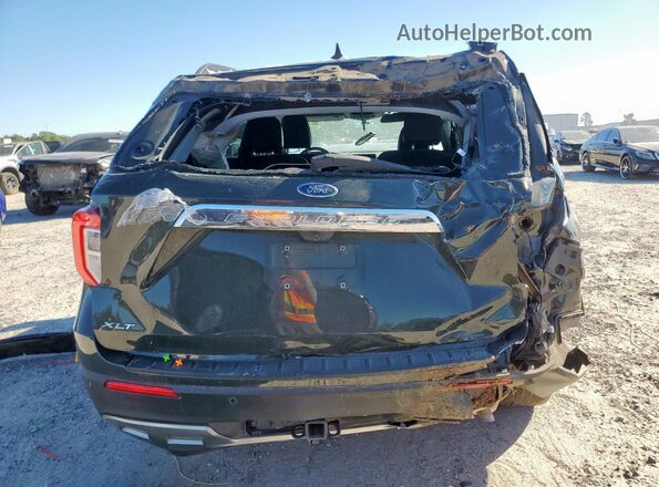 1FMSK7DH0RGA35021 2024 FORD FORD EXPLORER Black Rear view