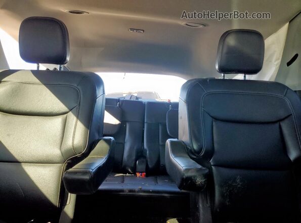 1FMSK7DH0RGA35021 2024 FORD FORD EXPLORER Black Rear seats view