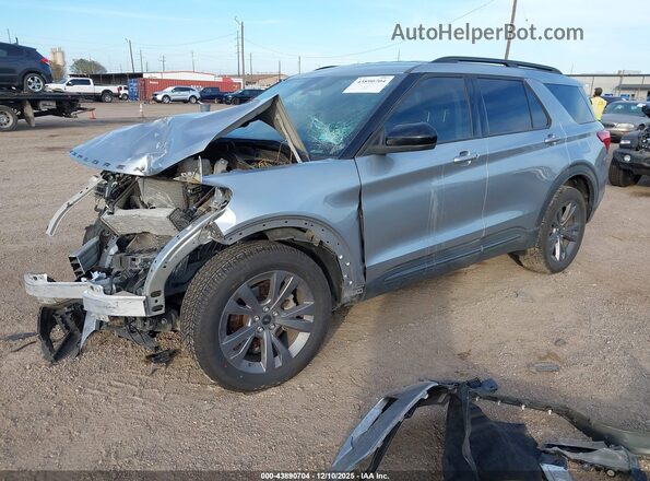1FMSK7DHXNGC15360 2022 FORD FORD EXPLORER Silver Vista tres cuartos delantera izquierda