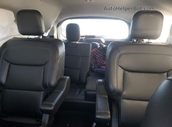 1FMSK8DH5RGA39006 2024 FORD FORD EXPLORER Silver Rear seats view
