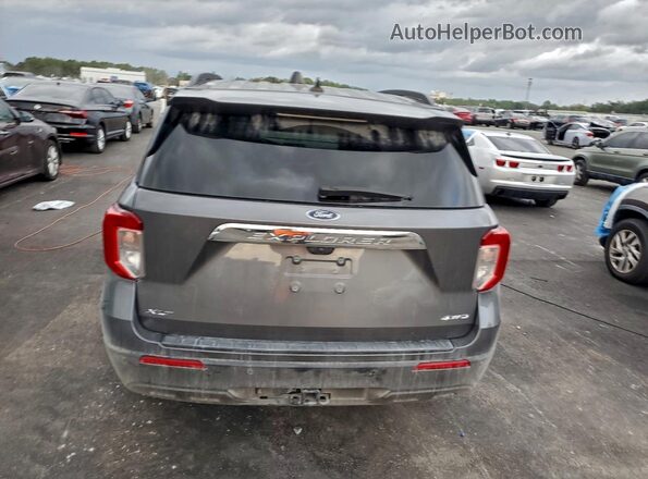 1FMSK8DH9RGA59517 2024 FORD FORD EXPLORER Gray Vista trasera