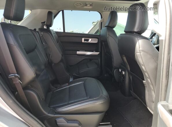 1FMSK8FH8RGA75611 2024 FORD FORD EXPLORER Silver Vista interior trasera