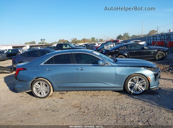 1G6DB5RK0P0139992 2023 CADILLAC CT4 Light Blue Սալոնի հետևի տեսք