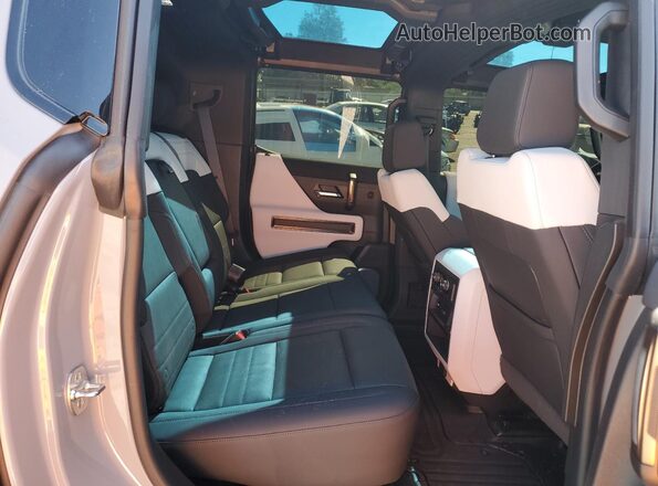 1GKB0RDC3RU114635 2024 GMC HUMMER Серый Вид задней части салона