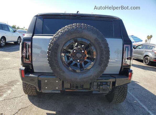 1GKB0RDC3RU114635 2024 GMC HUMMER Серый Вид сзади