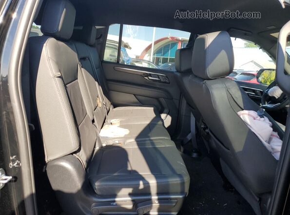 1GNS6DRD4SR343971 2025 CHEVROLET SUBURBAN Black Вид задньої частини салону