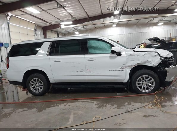 1GNSCCKDXPR120628 2023 CHEVROLET SUBURBAN White Widok wnętrza z tyłu