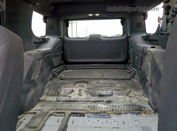 1GNSCLED2NR247897 2022 CHEVROLET TAHOE White Vista de los asientos traseros