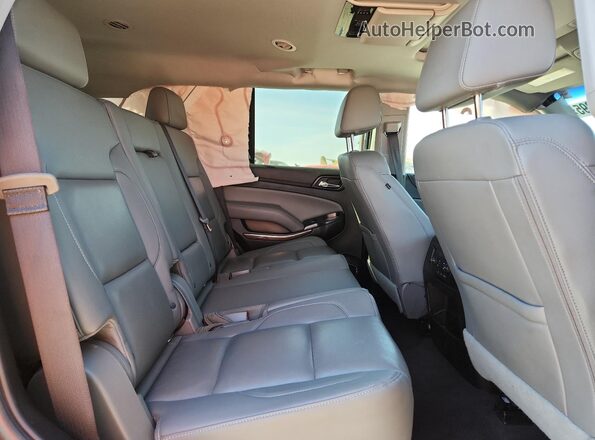 1GNSKBKC7LR229353 2020 CHEVROLET TAHOE Red Widok wnętrza z tyłu