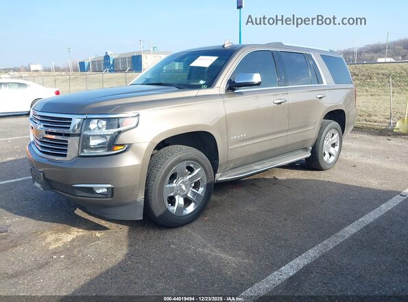 1GNSKCKC7GR248755 2016 CHEVROLET TAHOE Коричневый Передняя левая четверть