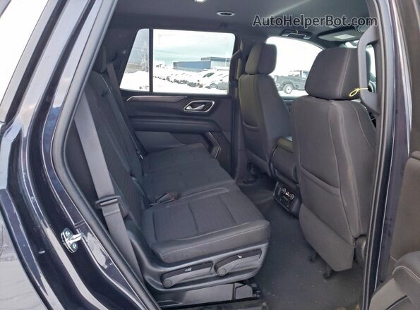 1GNSKMED1PR205457 2023 CHEVROLET TAHOE Black Vista interior trasera