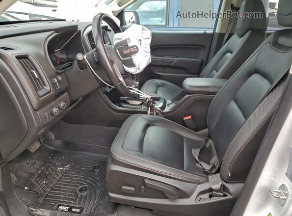 1GTP6FE19M1295200 2021 GMC CANYON White Вид салону спереду