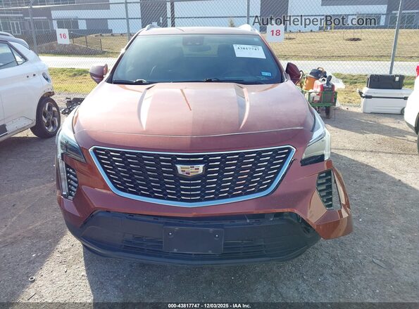 1GYAZAR44MF045817 2021 CADILLAC XT4 Orange Instrument cluster view
